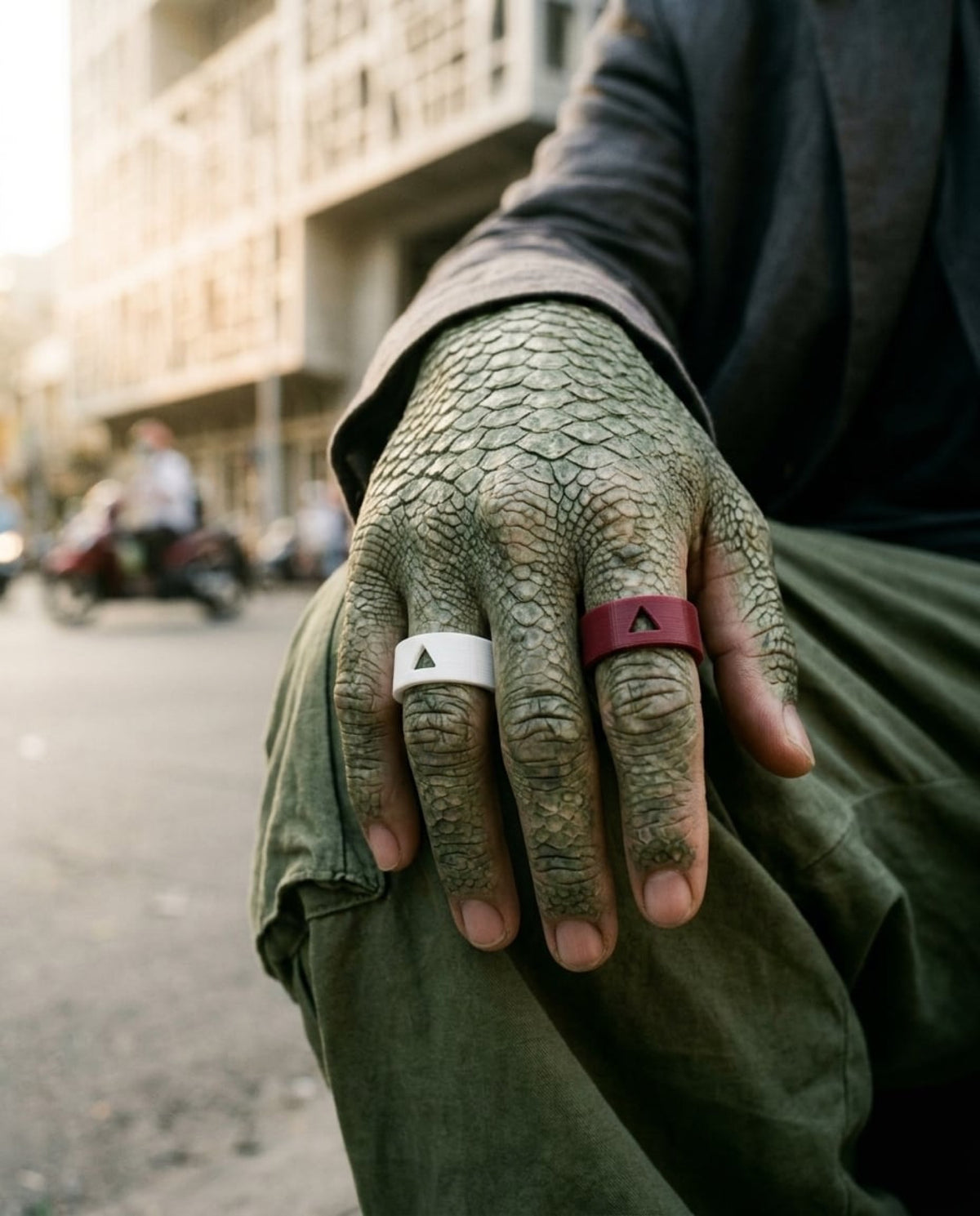 FK U** RINGS — Iguana Ho Chi Minh hand close-up — ATTITUDE DESIGN